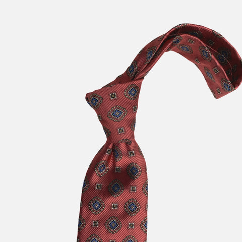 Handmade 100% Silk Tie – Brick Red with Blue and Gold Medallion Pattern Handmade 100% Silk Tie – Brick Red with Blue and Gold Medallion Pattern
