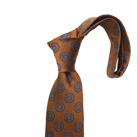 Elegant Orange Silk Tie with Blue Circular Pattern