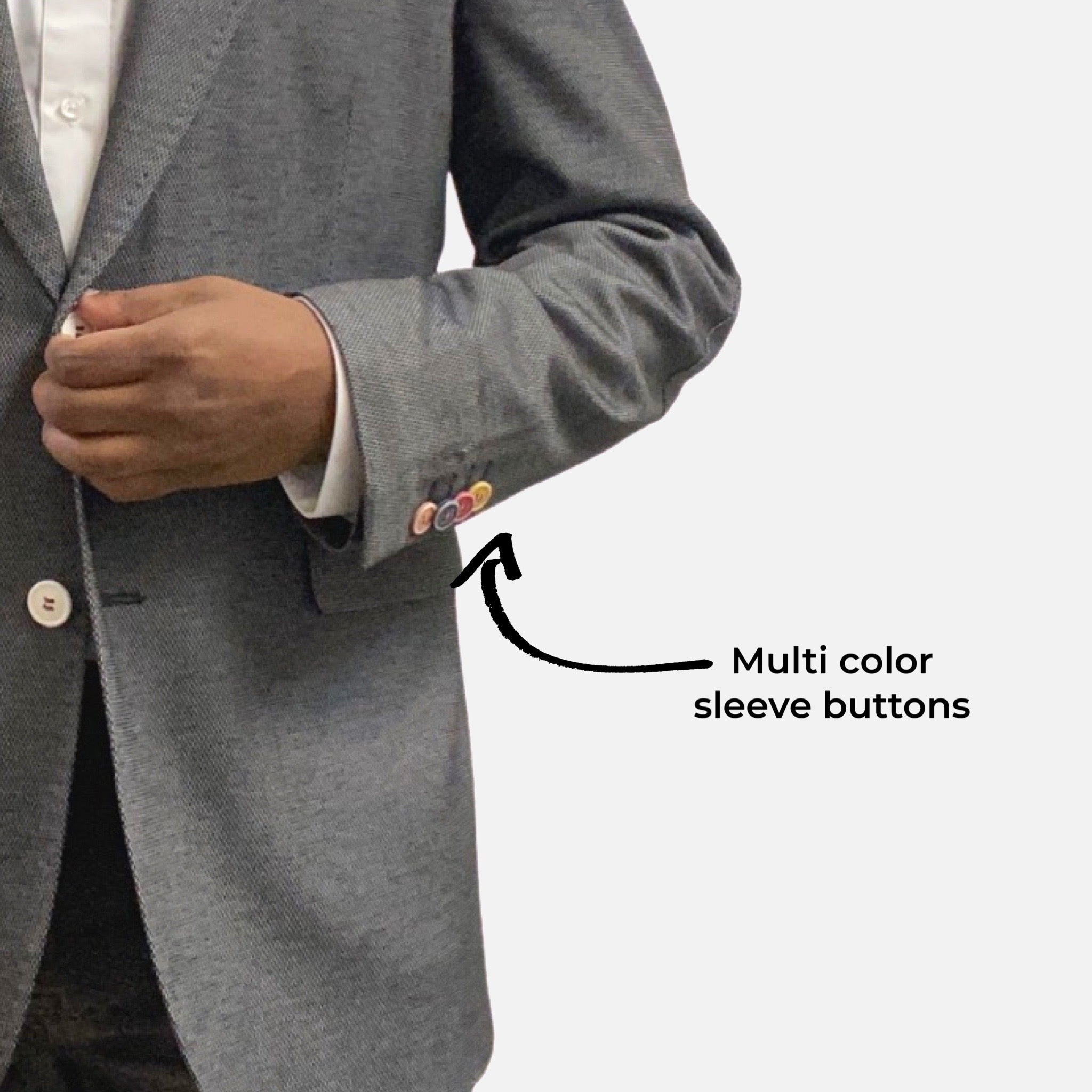Multi color buttons on sleeve of blazer